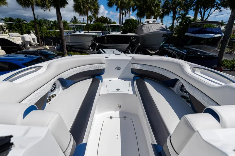 Slide: The Image of 2023 Hurricane SunDeck 2690 OB boat interior with luxurious seating and modern design. - 31