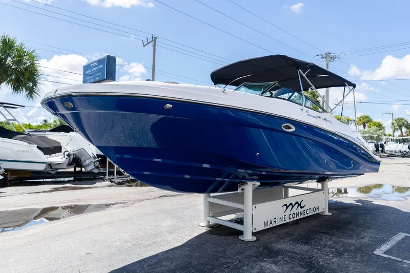 Slide: The Image of 2023 Hurricane SunDeck 2690 OB boat displayed at Marine Connection dealership. - 4