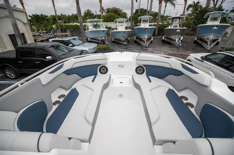 Slide: The Image of 2023 Hurricane SunDeck 2200 OB boat interior with spacious seating and modern design. - 20