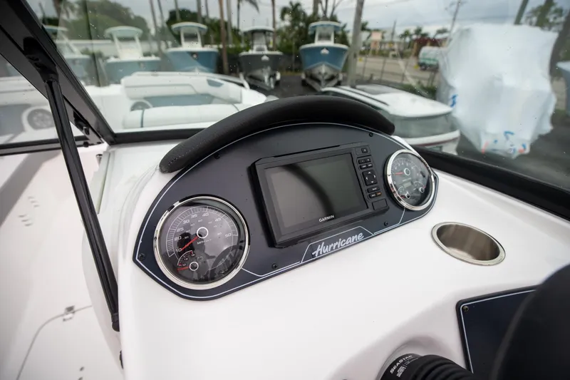 Slide: The Image of Dashboard of 2023 Hurricane SunDeck 2200 OB boat with gauges and display. - 26