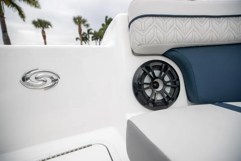 Slide: The Image of 2023 Hurricane SunDeck 2200 OB boat interior with speaker and stylish seating. - 43