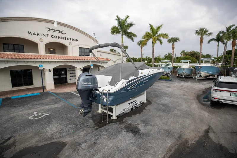 Slide: The Image of 2023 Hurricane SunDeck 2200 OB boat at Marine Connection dealership. - 8