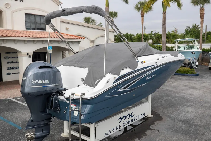 Slide: The Image of 2023 Hurricane SunDeck 2200 OB boat with Yamaha engine, covered and displayed at Marine Connection. - 9