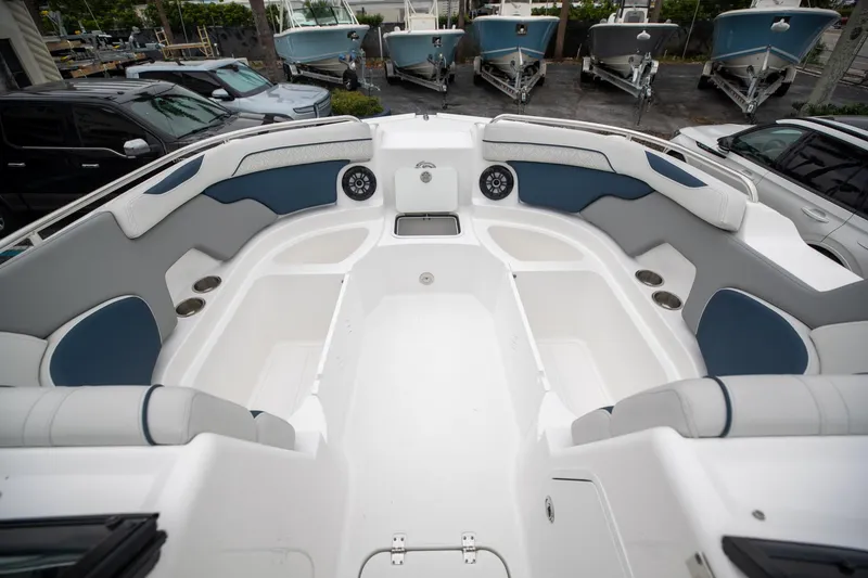Slide: The Image of 2023 Hurricane SunDeck 2200 OB boat interior with spacious seating and modern design. - 26