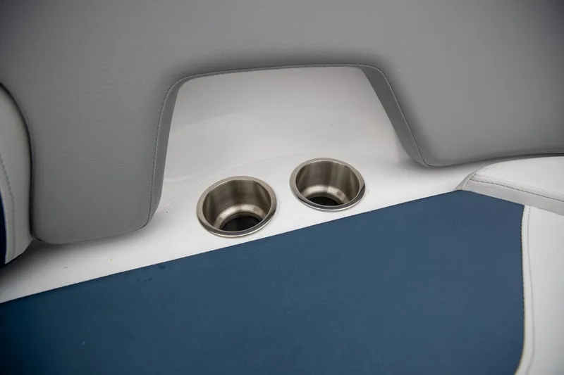 Slide: The Image of 2023 Hurricane SunDeck 2200 OB boat interior with dual cup holders. - 31