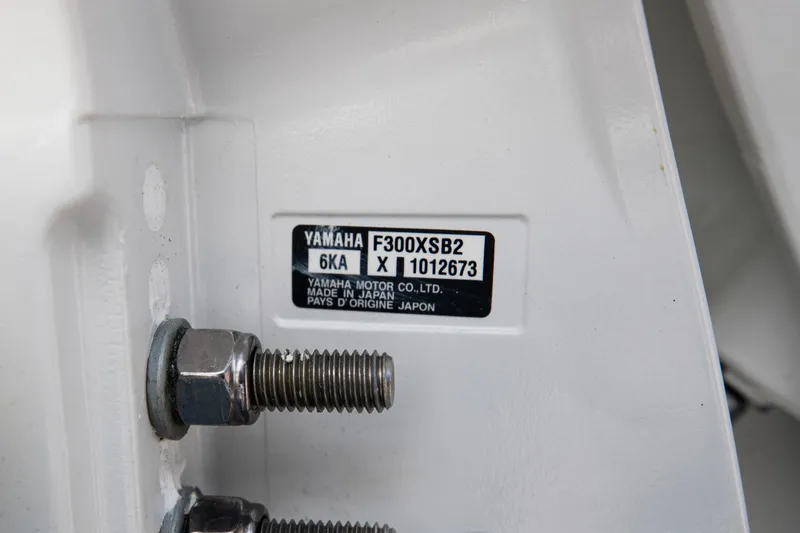 Slide: The Image of Close-up of Yamaha F300XSB2 engine label on 2024 Cobia 320 CC boat. - 46