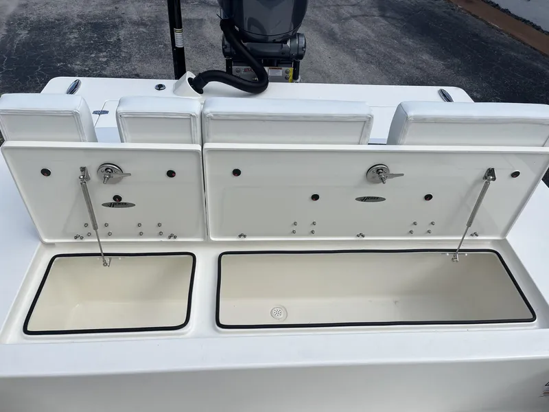 Slide: The Image of 2024 Hewes Redfisher 21 boat storage compartments, open and ready for use. - 18