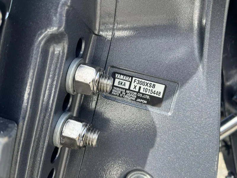 Slide: The Image of Close-up of Yamaha F300XSB engine label on 2024 Hewes Redfisher 21 boat. - 9