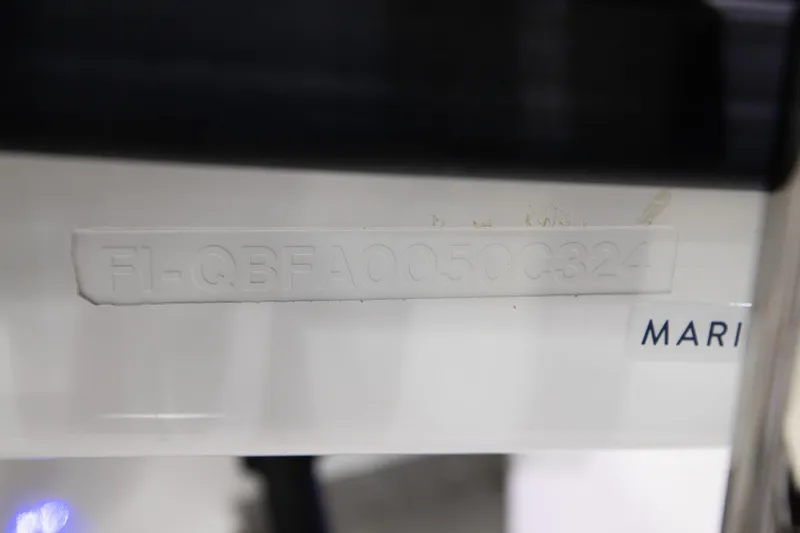 Slide: The Image of 2024 Quarken 27 T-Top V2 hull identification number close-up. - 28