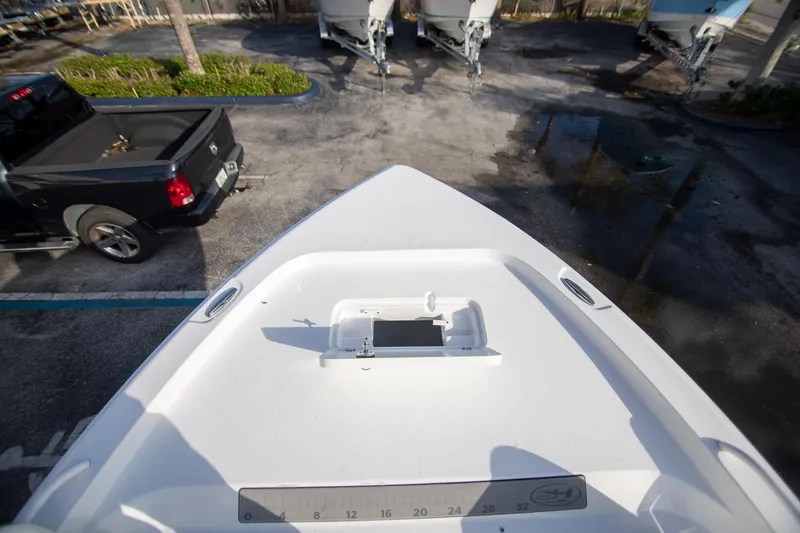 Slide: The Image of 2024 Sea Hunt BX 25 FS boat bow view in parking lot. - 22