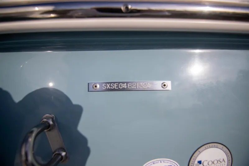 Slide: The Image of 2024 Sea Hunt BX 25 FS boat hull identification number plate. - 32