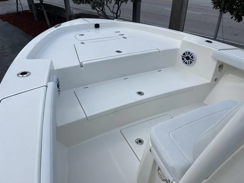 Slide: The Image of 2024 Pathfinder 2400 Open boat interior with seating and storage compartments. - 15