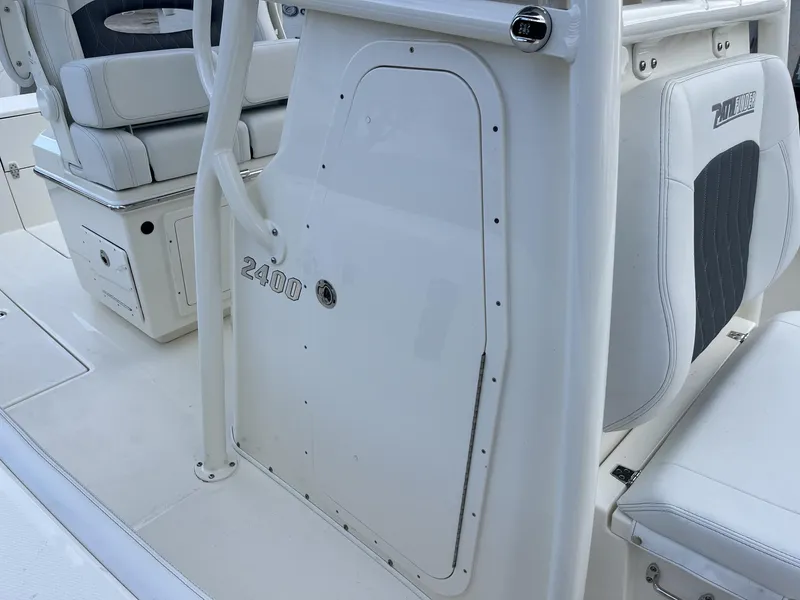 Slide: The Image of 2024 Pathfinder 2400 Open boat interior with seating and storage compartments. - 18