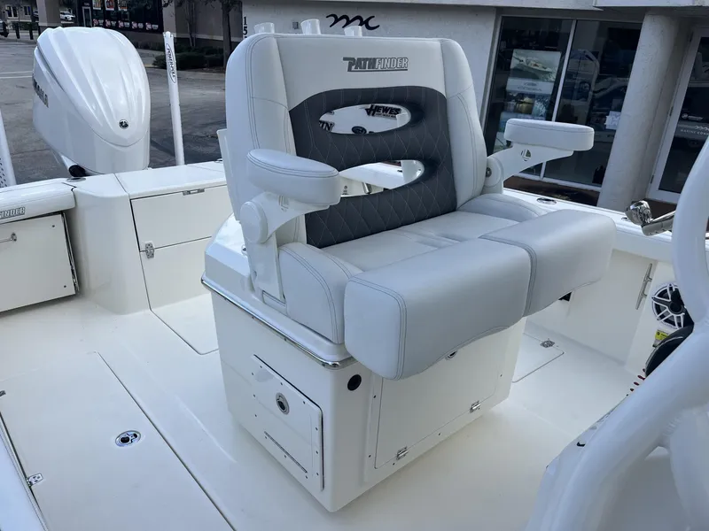 Slide: The Image of 2024 Pathfinder 2400 Open boat interior with cushioned seating and storage. - 20