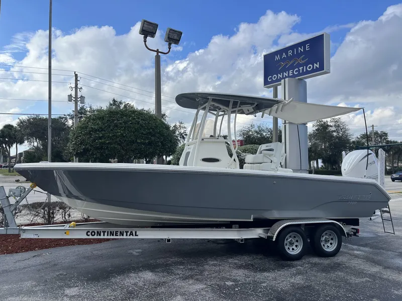 Slide: The Image of 2024 Pathfinder 2400 Open boat on trailer at Marine Connection dealership. - 30