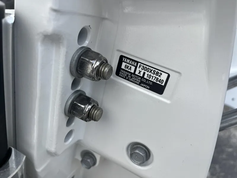 Slide: The Image of Close-up of Yamaha F300XSB2 engine label on 2024 Pathfinder 2400 Open boat. - 8
