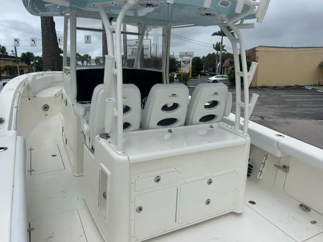 Slide: The Image of 2024 Cobia 350 CC boat interior with seating and storage compartments. - 3