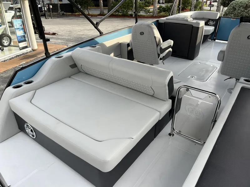 Slide: The Image of 2024 Hurricane FunDeck 2360 SFL OB interior with spacious seating and modern design. - 11