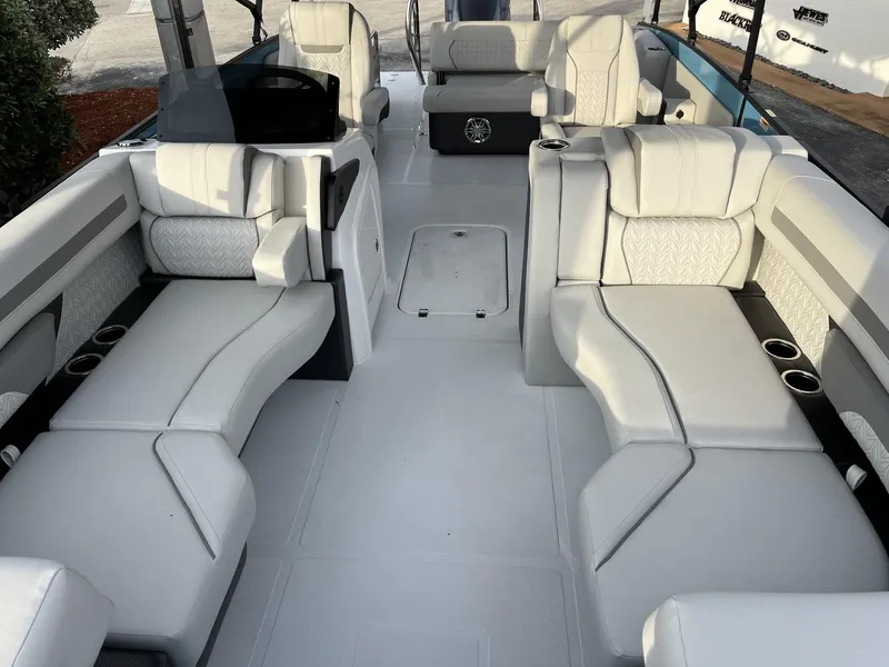 Slide: The Image of 2024 Hurricane FunDeck 2360 SFL OB boat interior with spacious seating and modern design. - 15