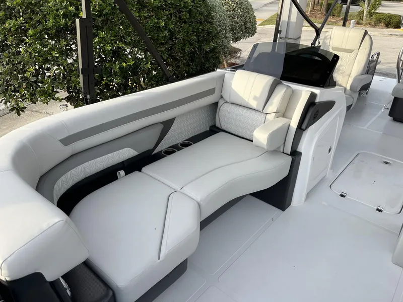 Slide: The Image of 2024 Hurricane FunDeck 2360 SFL OB boat interior with luxurious seating and modern design. - 16