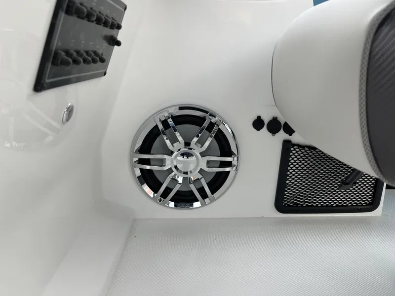 Slide: The Image of 2024 Hurricane FunDeck 2360 SFL OB interior speaker and control panel detail. - 23