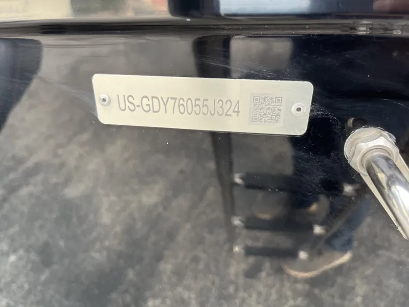 Slide: The Image of 2024 Hurricane FunDeck 2360 SFL OB boat identification plate with QR code. - 7