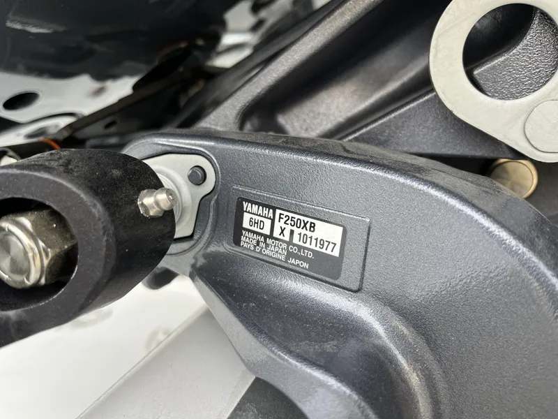 Slide: The Image of Close-up of Yamaha F250XB engine part on 2024 Hurricane FunDeck 2360 SFL OB boat. - 8
