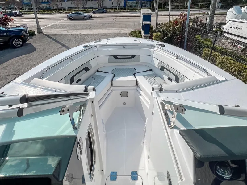 Slide: The Image of 2024 Blackfin 272DC boat interior with spacious seating and modern design. - 8