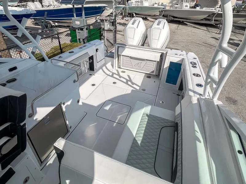 Slide: The Image of 2024 Blackfin 272DC boat interior with seating and storage compartments. - 11