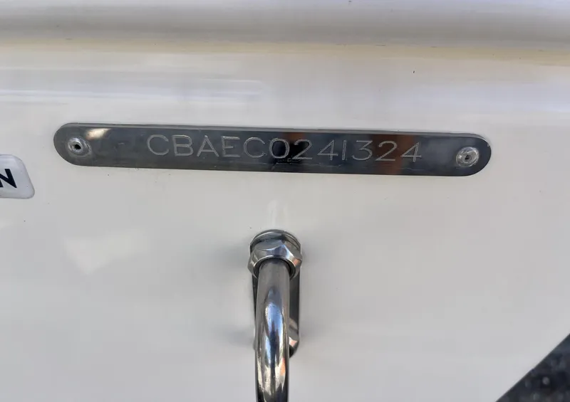 Slide: The Image of 2024 Cobia 262 CC boat hull identification number plate. - 7