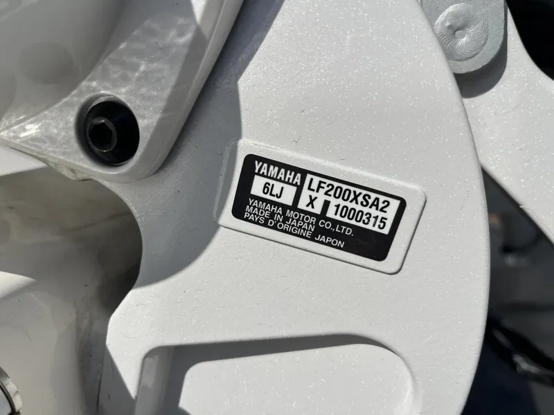 Slide: The Image of Close-up of Yamaha LF200XSA2 engine label on 2024 Cobia 262 CC boat. - 8
