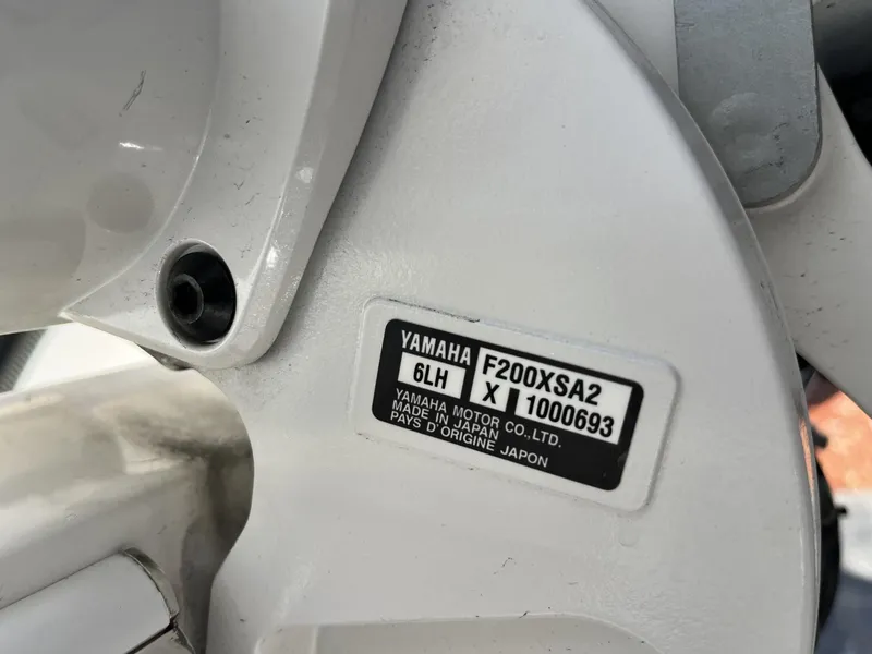 Slide: The Image of Yamaha motor label on 2024 Cobia 262 CC boat engine. - 9