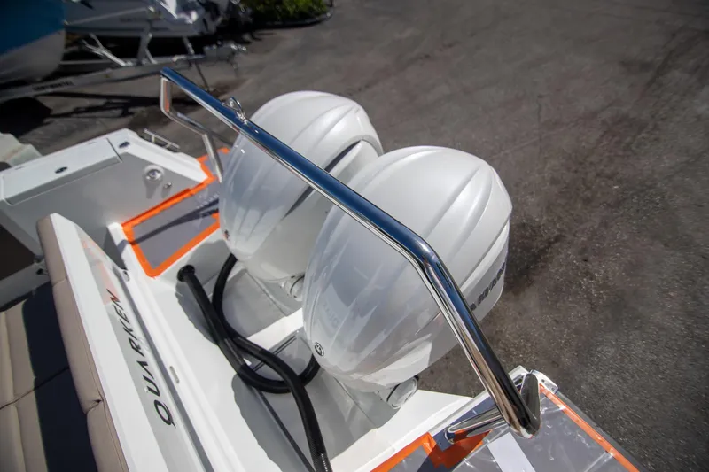 Slide: The Image of 2024 Quarken 35 Cabin boat with dual outboard motors and sleek design. - 15