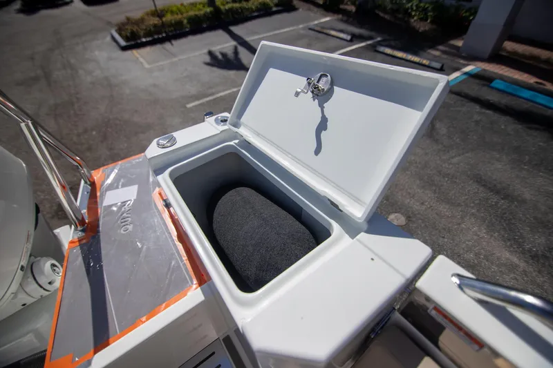 Slide: The Image of Open storage compartment on 2024 Quarken 35 Cabin boat, showing interior details. - 18