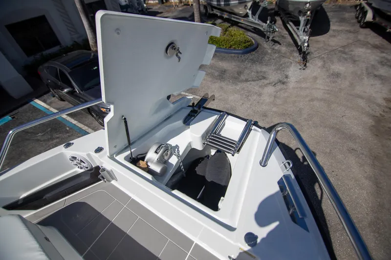 Slide: The Image of 2024 Quarken 35 Cabin boat with open storage compartment and anchor system. - 27