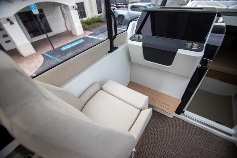 Slide: The Image of Interior of 2024 Quarken 35 Cabin, featuring a comfortable seat and modern dashboard. - 49