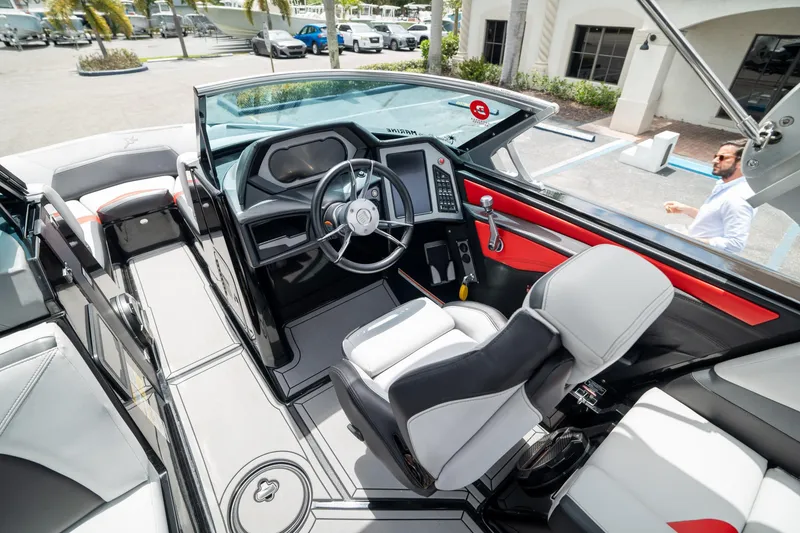 Slide: The Image of 2019 MasterCraft X-Star boat interior with modern dashboard and steering wheel. - 11