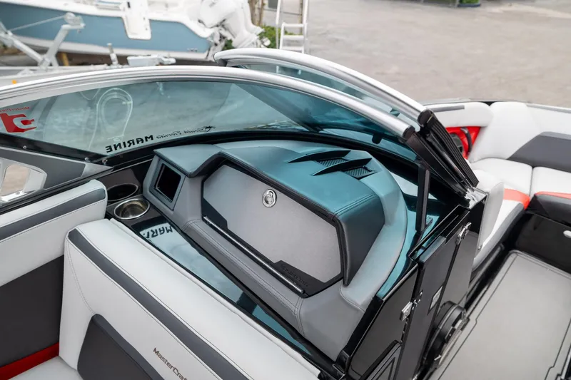 Slide: The Image of Interior of a 2019 MasterCraft X-Star boat, featuring sleek seating and modern design. - 12