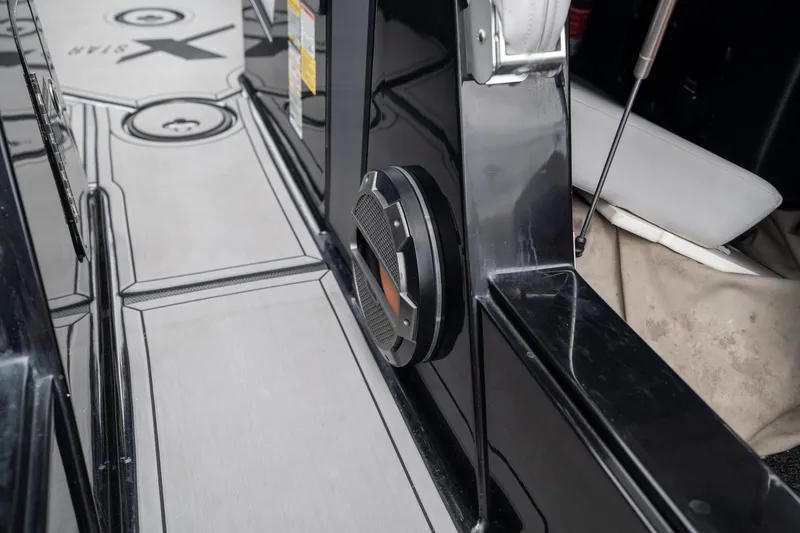 Slide: The Image of 2019 MasterCraft X-Star boat interior with speaker and sleek design. - 28
