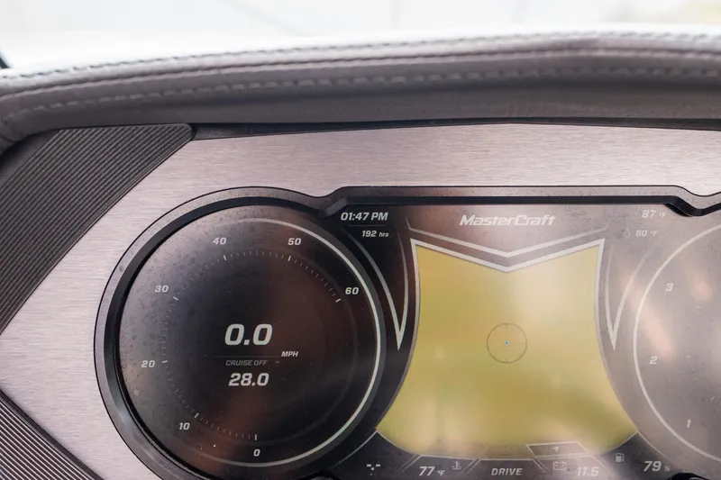 Slide: The Image of Dashboard of a 2019 MasterCraft X-Star boat showing speedometer and digital display. - 47