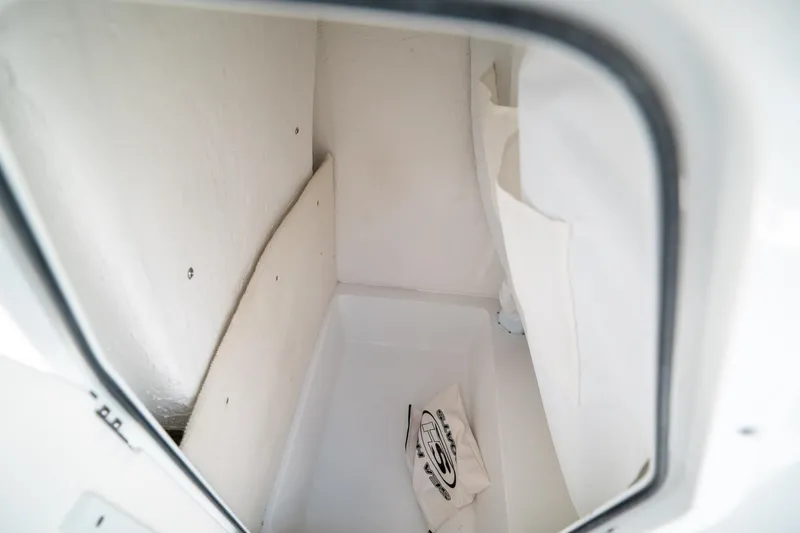 Slide: The Image of Interior storage compartment of 2025 Sea Hunt Ultra 219 boat. - 29