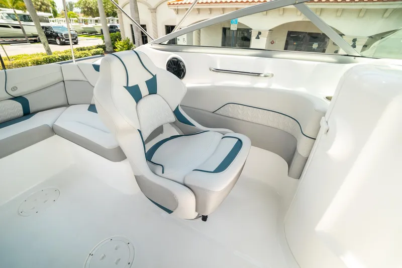 Slide: The Image of 2024 Hurricane SunDeck 2400 OB boat interior with stylish seating and modern design. - 18