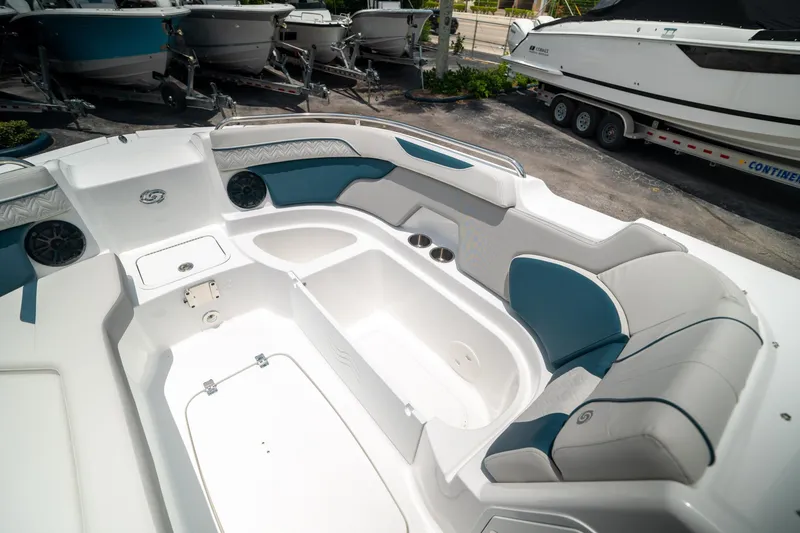 Slide: The Image of 2024 Hurricane SunDeck 2400 OB interior, featuring spacious seating and modern design elements. - 36