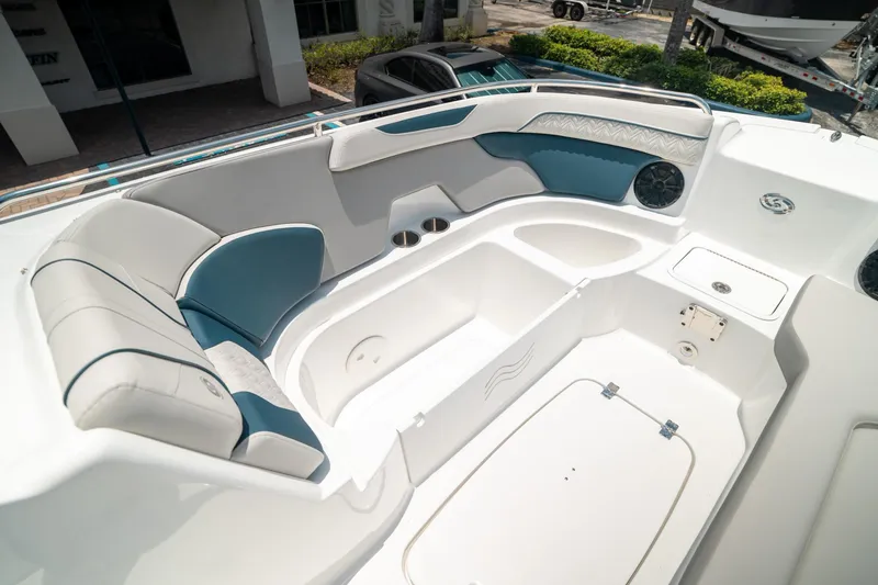 Slide: The Image of 2024 Hurricane SunDeck 2400 OB boat interior with spacious seating and modern design. - 37