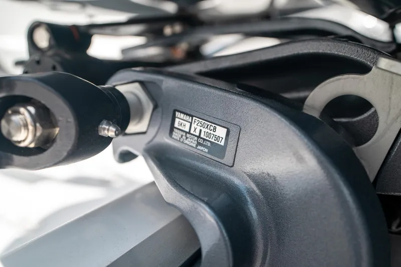 Slide: The Image of Close-up of a 2024 Hurricane SunDeck 2400 OB engine component with Yamaha label. - 40