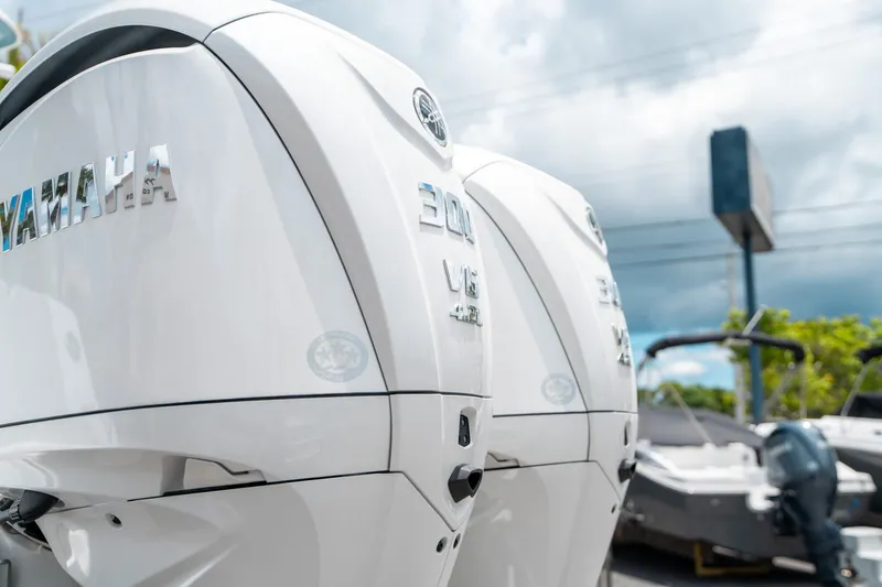 Slide: The Image of Close-up of Yamaha outboard engines on a 2025 Sea Hunt Gamefish 28 FS boat. - 9