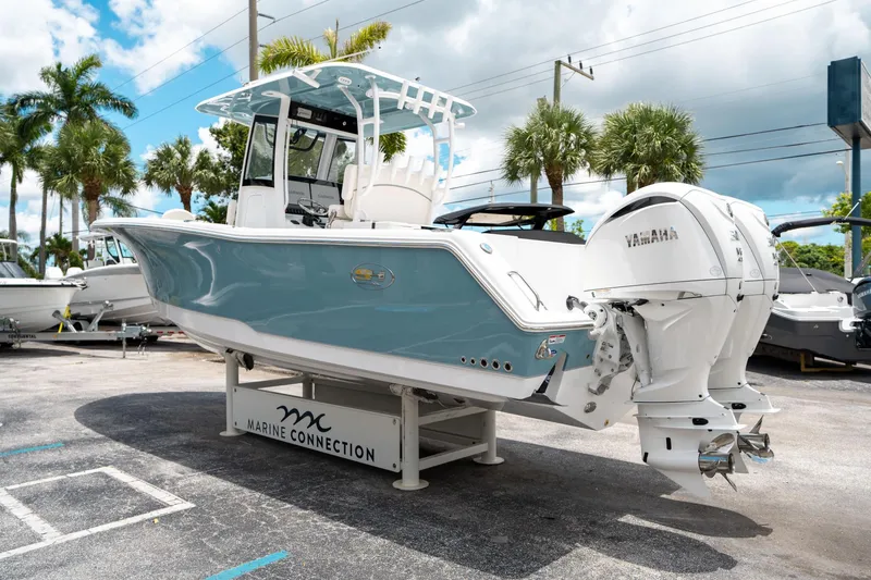 Slide: The Image of 2025 Sea Hunt Gamefish 28 FS boat with twin Yamaha engines on display. - 4