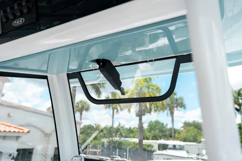 Slide: The Image of Interior view of 2025 Sea Hunt Gamefish 28 FS boat, showcasing window design. - 31