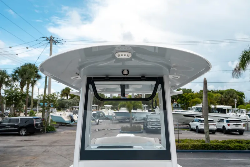 Slide: The Image of 2025 Sea Hunt Ultra 239 SE boat, featuring a sleek design and modern amenities. - 41