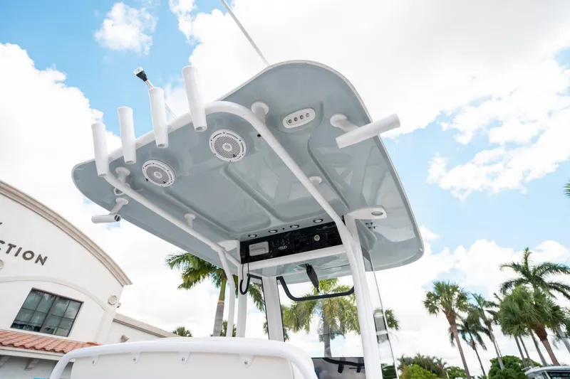 Slide: The Image of 2025 Sea Hunt Ultra 239 SE boat top view with rod holders and speakers. - 24